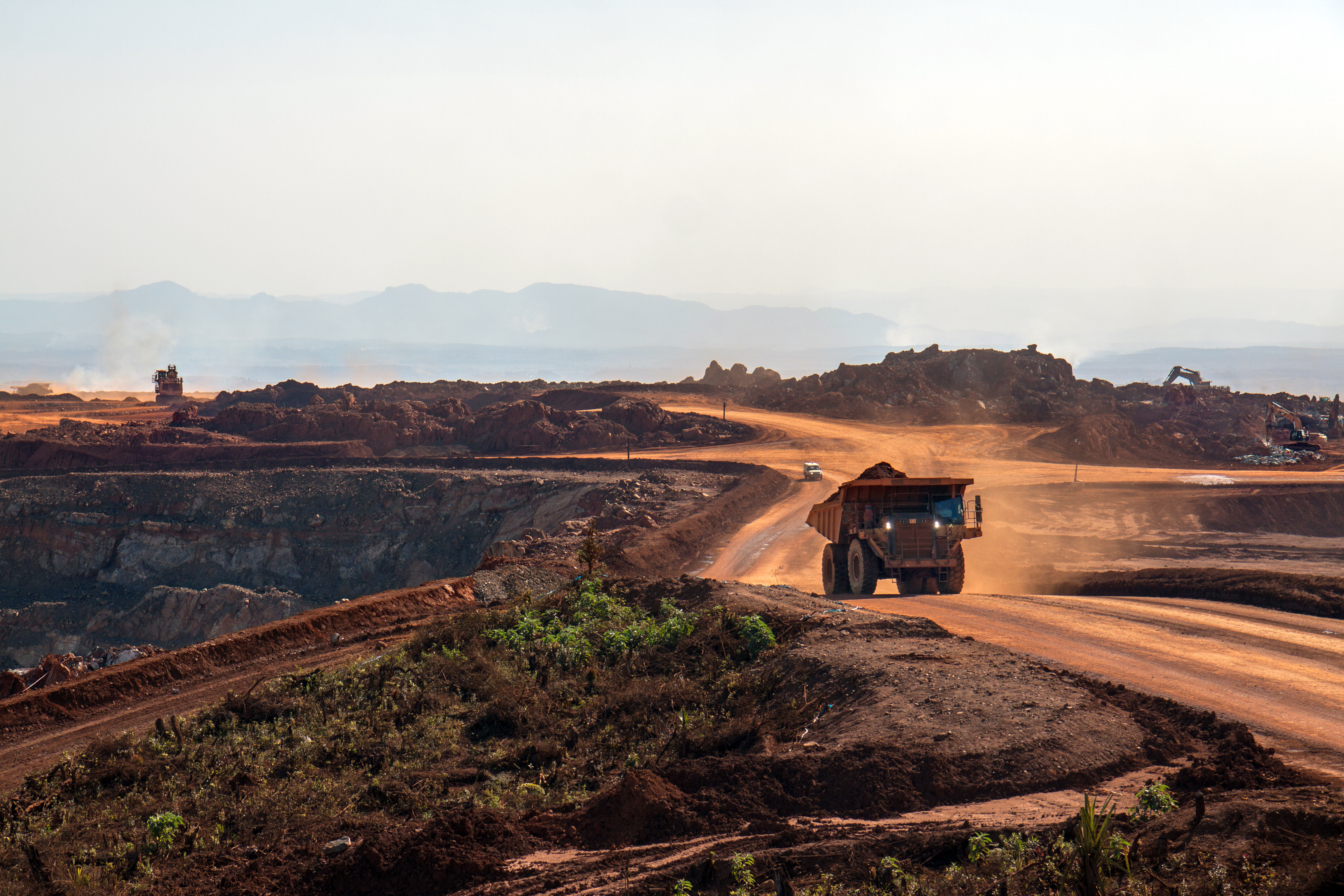 Image of a landscape of a mining facility with fleet vehicles, the facility could be any where in the world.